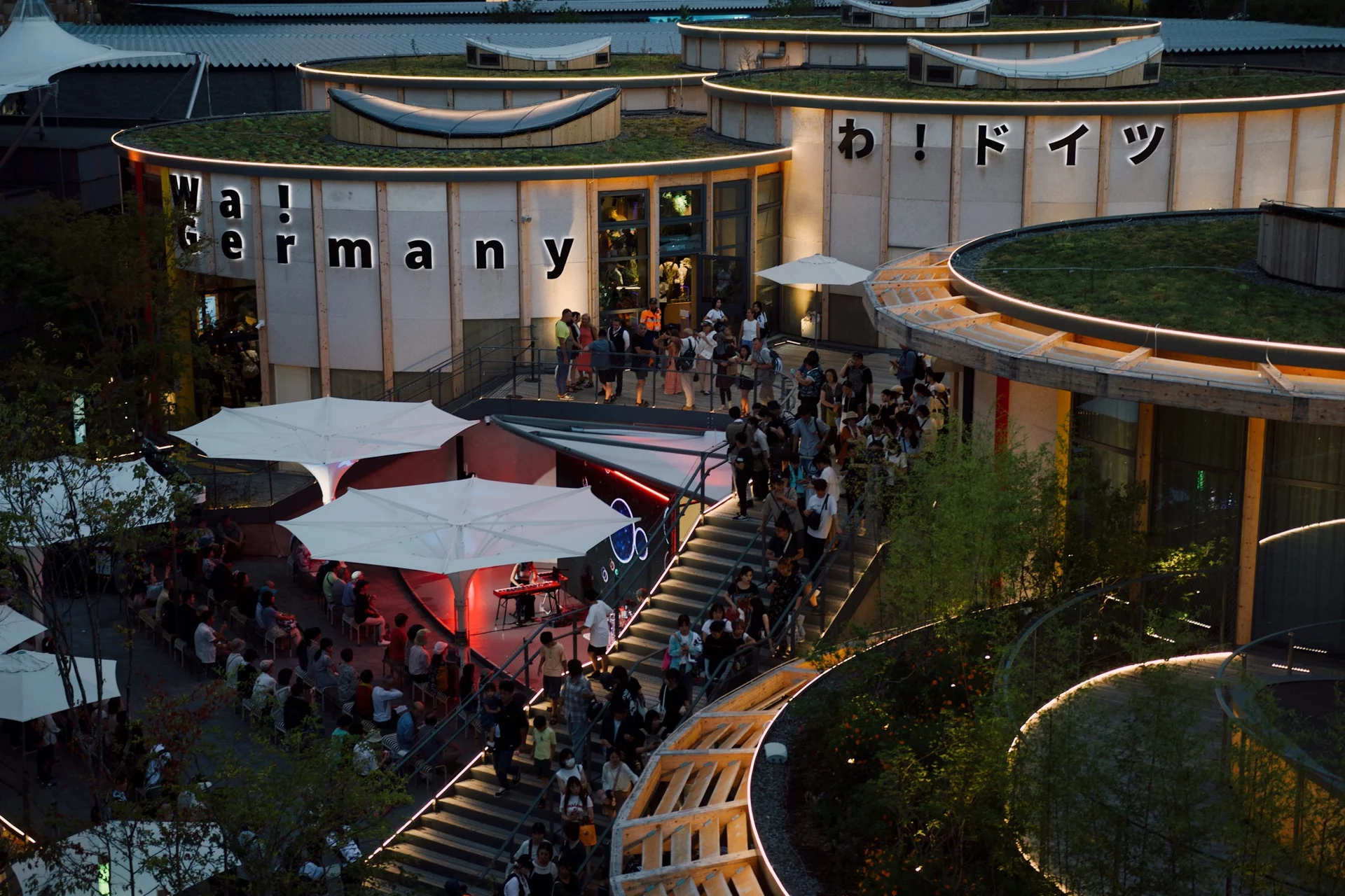 A performance and its audience at the German Pavilion, EXPO 2025 Osaka.